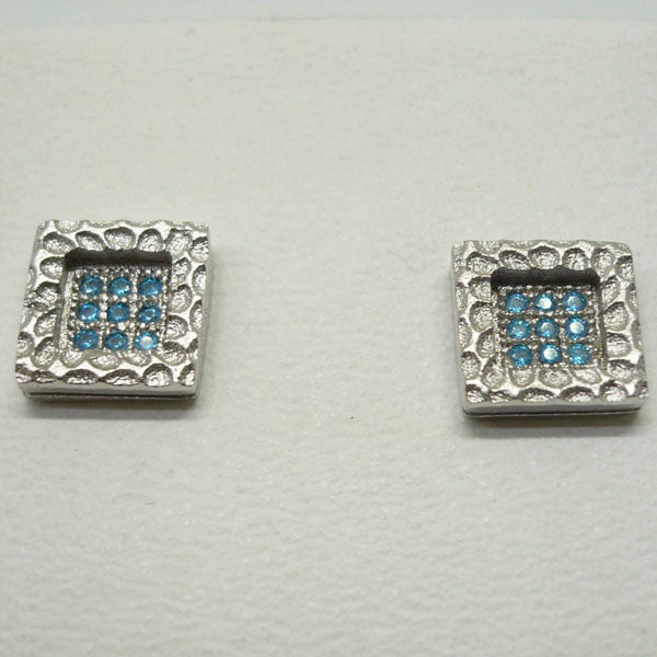 Pendientes de plata de ley con circonitas azules y acabado en mate