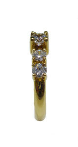Sortija de oro 18k cinquillo de circonitas